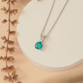 Elegant Silver Necklace with Green Crystal